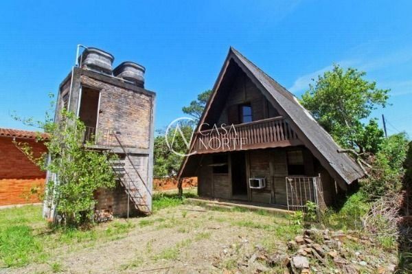 Casa à venda com 6 quartos, 430m², 2 suítes, 4 vagas, Rua Comendador Castro no bairro Ipanema em Porto Alegre