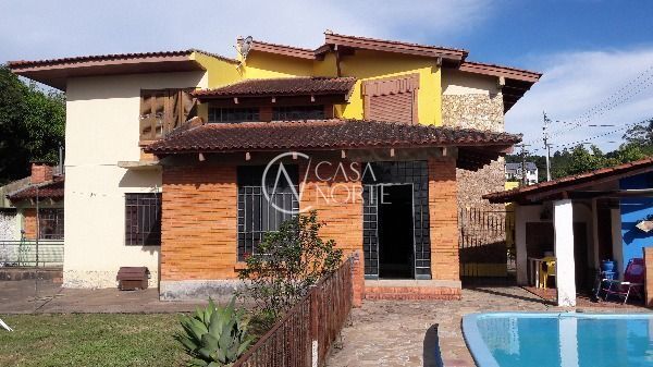 Casa à venda com 4 quartos, 350m², 2 suítes, 4 vagas, Acesso Doutor Marino dos Santos no bairro Aberta dos Morros em Porto Alegre