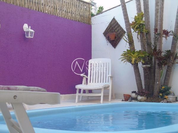 Casa à venda com 3 quartos, 306m², 1 suíte, 2 vagas, Avenida Celestino Bertolucci no bairro Hípica em Porto Alegre