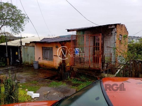 Casa à venda com 3 quartos, 122m², 4 vagas, Rua Gregório Perez no bairro Cavalhada em Porto Alegre