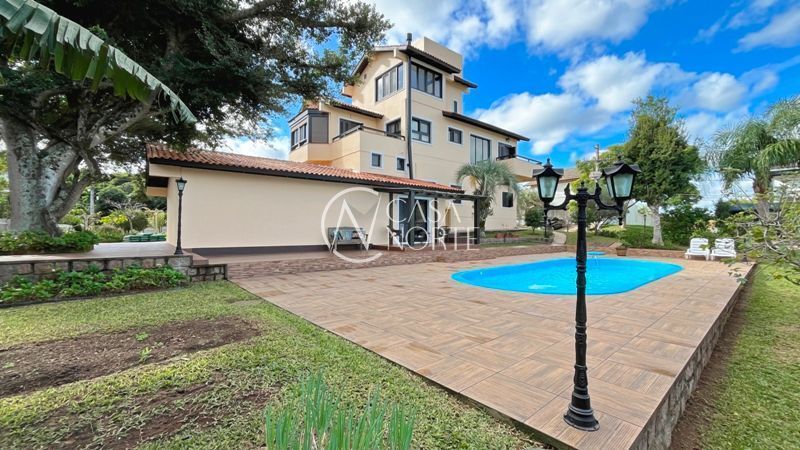 Casa de Condomínio à venda com 5 quartos, 455m², 2 suítes, 7 vagas, Rua Francisco Solano Borges no bairro Hípica em Porto Alegre