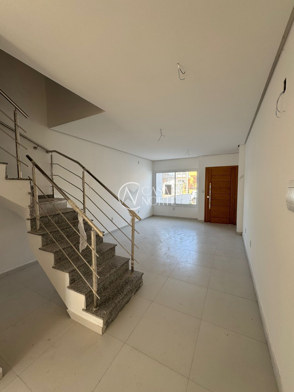 Casa à venda com 3 quartos, 126m², 3 suítes, 2 vagas, Rua Itacyr Rossi no bairro Guarujá em Porto Alegre