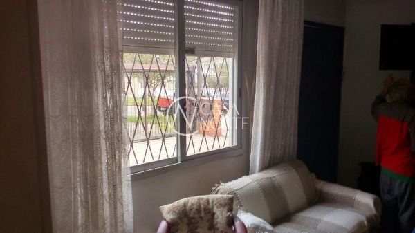 Casa à venda com 3 quartos, 220m², 3 vagas, Avenida Joracy Camargo no bairro Santa Tereza em Porto Alegre