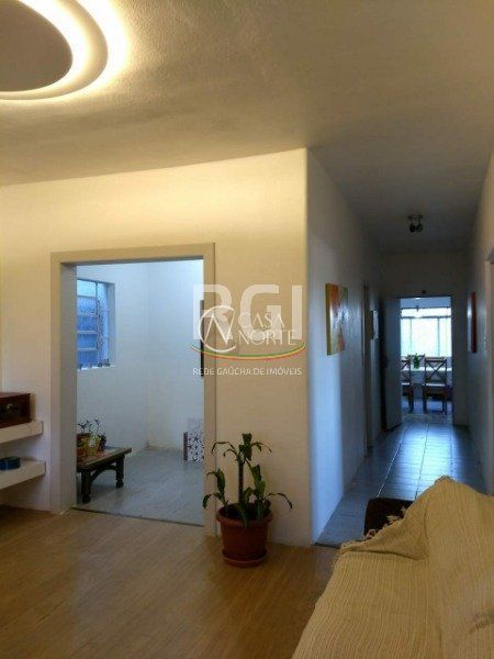 Casa à venda com 3 quartos, 150m², 2 vagas, Rua Pedro de Oliveira Franca no bairro Hípica em Porto Alegre