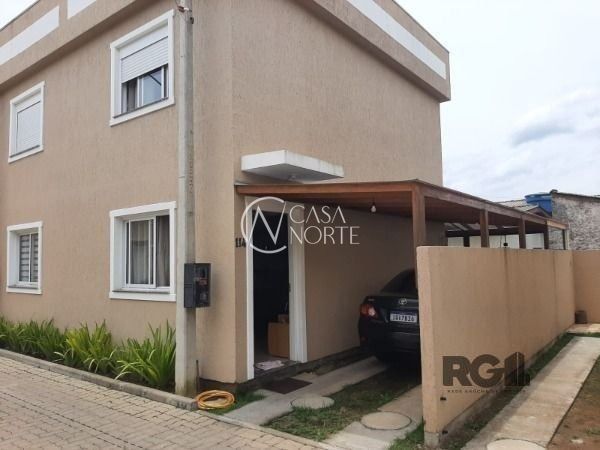 Casa à venda com 2 quartos, 55m², 2 vagas, Rua das Espatódeas no bairro Ponta Grossa em Porto Alegre