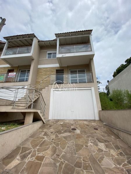 Casa à venda com 3 quartos, 202m², 2 suítes, 2 vagas, Rua Antônio Spolidoro no bairro Aberta dos Morros em Porto Alegre