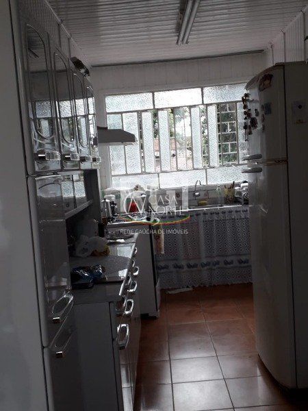 Casa à venda com 4 quartos, 90m², 3 vagas, Rua Coronel Claudino no bairro Cristal em Porto Alegre