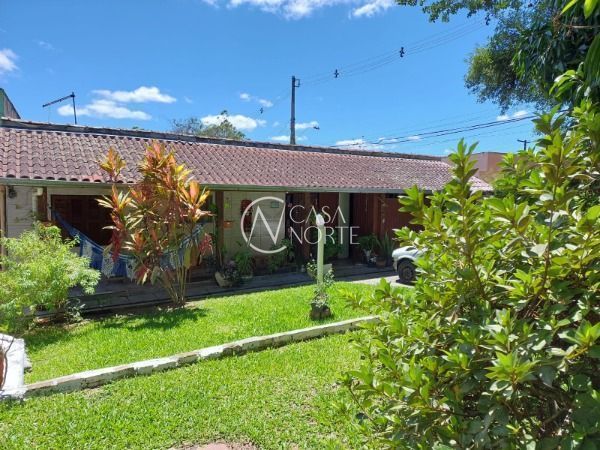 Casa à venda com 4 quartos, 111m², 2 suítes, 3 vagas, Avenida Heitor Vieira no bairro Belém Novo em Porto Alegre