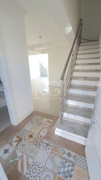 Casa de Condomínio à venda com 3 quartos, 128m², 1 suíte, 2 vagas, Rua Carlos Eduardo de Sa no bairro Aberta dos Morros em Porto Alegre