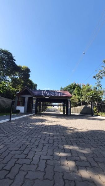 Terreno à venda  com 122m², Estrada Jorge Pereira Nunes no bairro Campo Novo em Porto Alegre