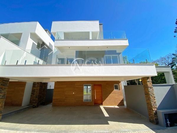 Casa de Condomínio à venda com 3 quartos, 364m², 3 suítes, 2 vagas, Avenida Coronel Marcos no bairro Pedra Redonda em Porto Alegre