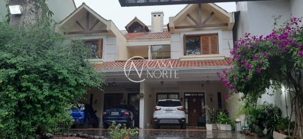 Casa à venda com 3 quartos, 181m², 1 suíte, 2 vagas, Rua Engenheiro Coelho Parreira no bairro Ipanema em Porto Alegre