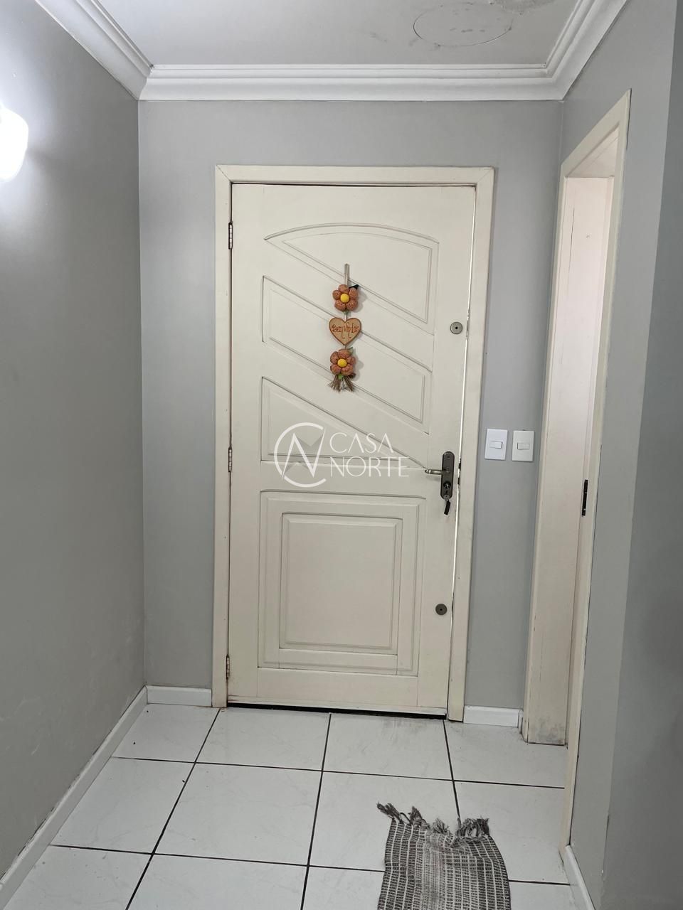 Casa à venda com 4 quartos, 356m², 4 suítes, 2 vagas, Rua Jerolomo Minuzo no bairro Vila Nova em Porto Alegre