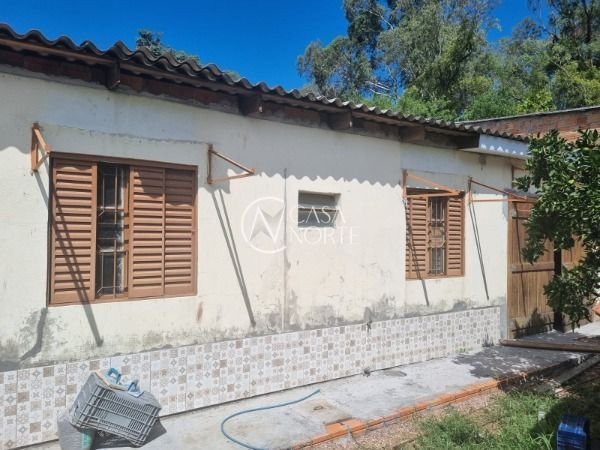 Casa à venda com 2 quartos, 110m², 5 vagas, Rua Professor Joaquim Louzada no bairro Camaquã em Porto Alegre