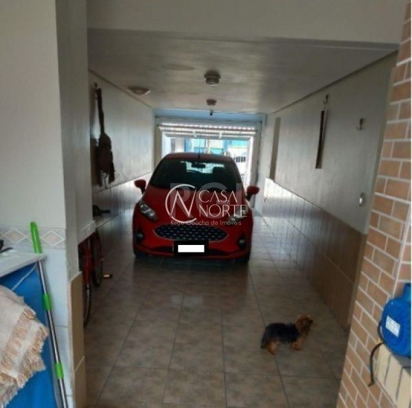 Casa à venda com 3 quartos, 231m², 1 suíte, 2 vagas, Rua Doutor Pitrez no bairro Ipanema em Porto Alegre