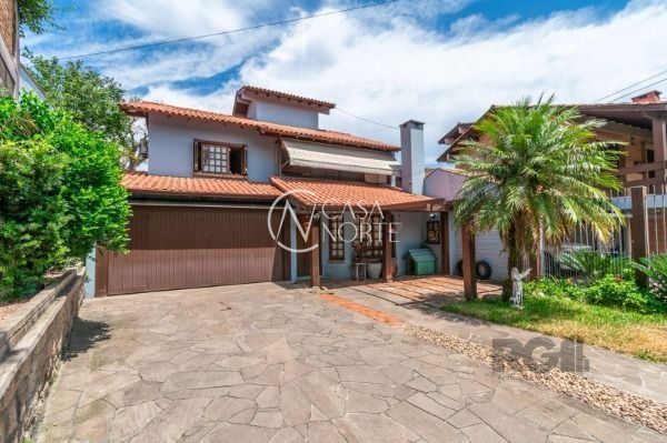 Casa à venda com 4 quartos, 270m², 1 suíte, 4 vagas, Rua Manoel Cabeda Perez no bairro Jardim Isabel em Porto Alegre