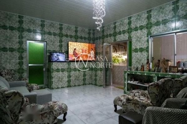 Casa à venda com 3 quartos, 300m², 3 suítes, 2 vagas, Rua João Francisco Barbosa no bairro Vila Nova em Porto Alegre