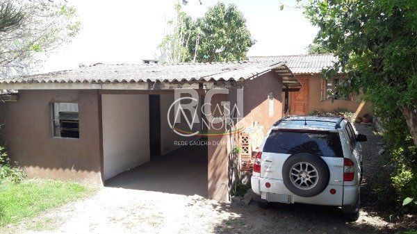 Casa à venda com 3 quartos, 120m², 1 suíte, 2 vagas, Avenida Juca Batista no bairro Hípica em Porto Alegre