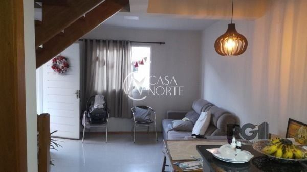 Casa à venda com 2 quartos, 55m², 2 vagas, Rua das Espatódeas no bairro Ponta Grossa em Porto Alegre