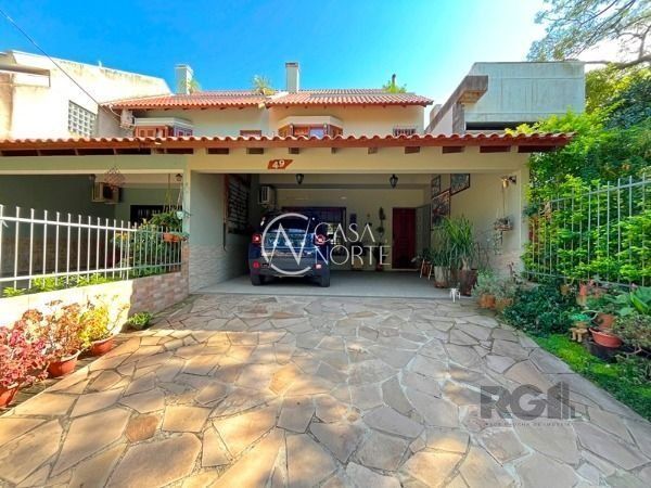 Casa à venda com 3 quartos, 274m², 1 suíte, 2 vagas, Rua Doutor Pio Ângelo no bairro Ipanema em Porto Alegre