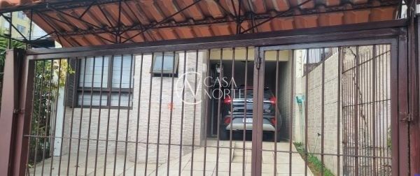 Sobrado à venda com 4 quartos, 167m², 1 suíte, 2 vagas, Rua Doutor Malheiros no bairro Santo Antônio em Porto Alegre