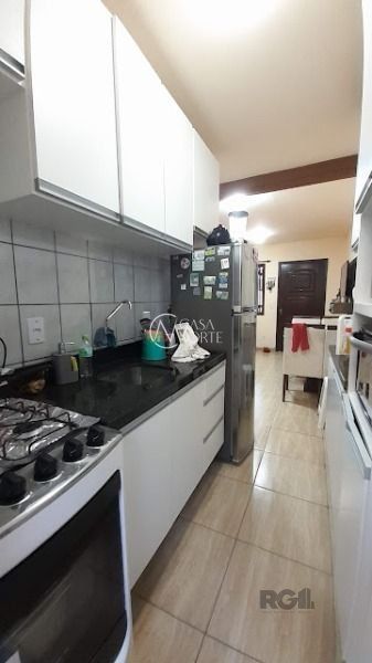 Casa de Condomínio à venda com 3 quartos, 60m², 1 vaga, Avenida Monte Cristo no bairro Vila Nova em Porto Alegre