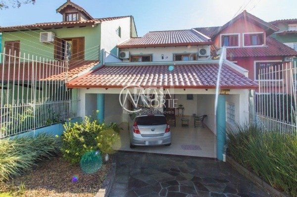 Casa à venda com 3 quartos, 154m², 1 suíte, 3 vagas, Rua Professor Othon Santos Silva no bairro Aberta dos Morros em Porto Alegre