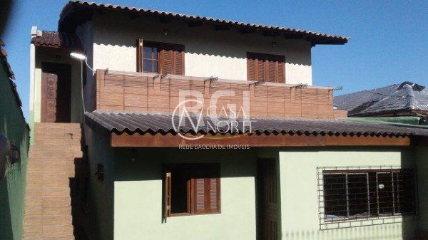 Casa à venda com 4 quartos, 450m², 1 suíte, 2 vagas, Avenida Benno Mentz no bairro Vila Ipiranga em Porto Alegre