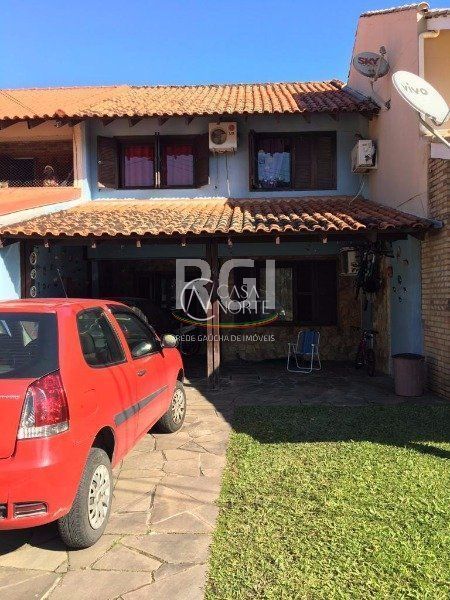 Casa de Condomínio à venda com 3 quartos, 122m², 2 vagas, Avenida Juca Batista no bairro Cavalhada em Porto Alegre