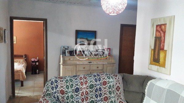 Casa à venda com 3 quartos, 120m², 1 suíte, 2 vagas, Avenida Juca Batista no bairro Hípica em Porto Alegre