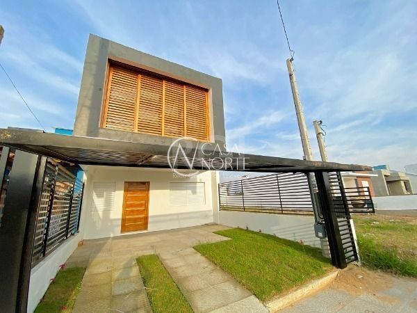 Casa à venda com 3 quartos, 217m², 1 suíte, 2 vagas, Rua Jorge Babot Miranda no bairro Aberta dos Morros em Porto Alegre