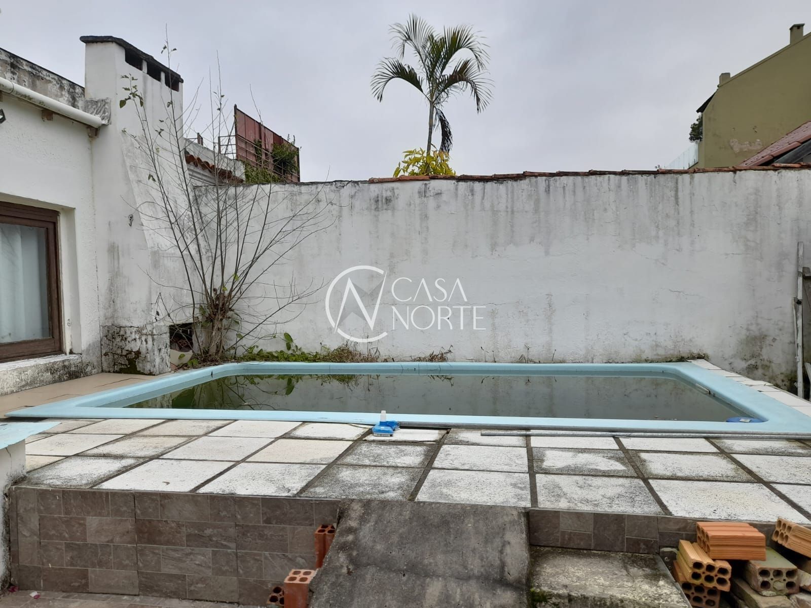 Casa à venda com 3 quartos, 184m², 1 suíte, 2 vagas, Rua das Laranjeiras no bairro Ipanema em Porto Alegre