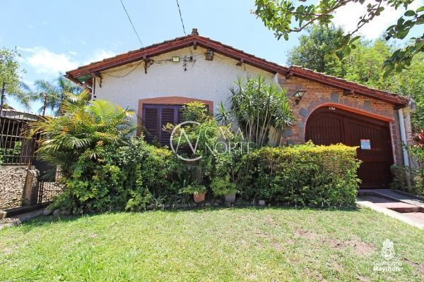 Casa à venda com 4 quartos, 180m², 3 vagas, Rua das Laranjeiras no bairro Ipanema em Porto Alegre