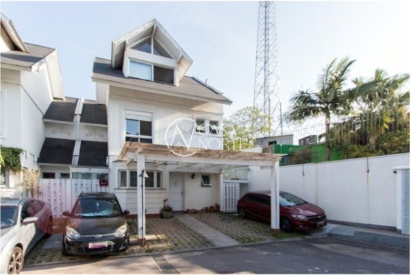 Casa de Condomínio à venda com 4 quartos, 150m², 2 suítes, 2 vagas, Rua Tocantins no bairro Lomba do Pinheiro em Porto Alegre