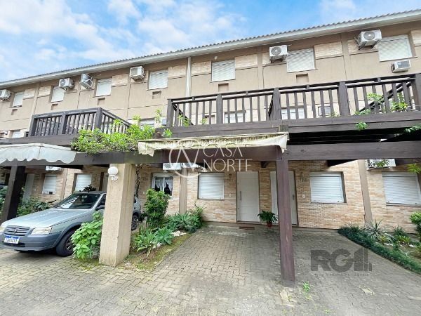 Casa de Condomínio à venda com 3 quartos, 100m², 1 suíte, 1 vaga, Avenida Juca Batista no bairro Cavalhada em Porto Alegre