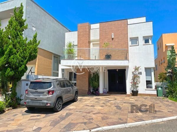 Casa à venda com 3 quartos, 248m², 1 suíte, 2 vagas, Avenida Edgar Pires de Castro no bairro Aberta dos Morros em Porto Alegre
