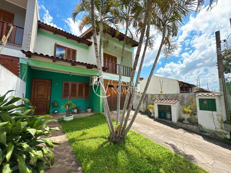 Casa à venda com 3 quartos, 190m², 1 suíte, 3 vagas, Rua Marcio Dias no bairro Nonoai em Porto Alegre