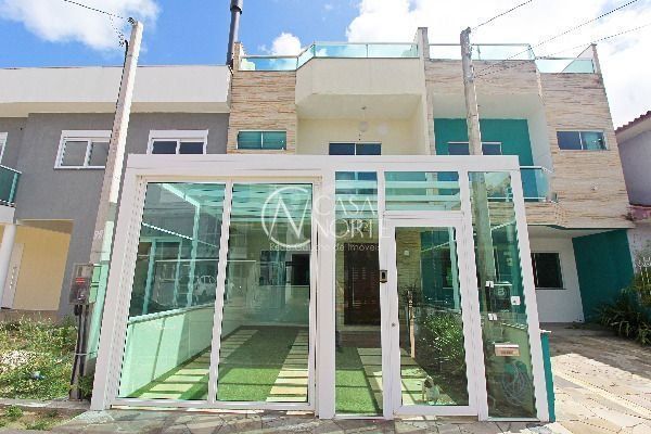 Casa à venda com 3 quartos, 201m², 1 suíte, Rua Angico no bairro Hípica em Porto Alegre