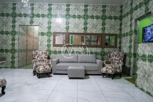 Casa à venda com 3 quartos, 300m², 3 suítes, 2 vagas, Rua João Francisco Barbosa no bairro Vila Nova em Porto Alegre