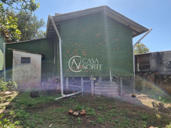 Casa à venda com 1 quarto, 90m², 3 vagas, Rua Serafim de Moraes Martins no bairro Vila Nova em Porto Alegre