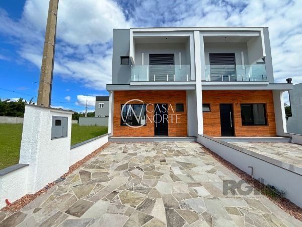 Casa de Condomínio à venda com 3 quartos, 115m², 1 suíte, 2 vagas, Estrada Jorge Pereira Nunes no bairro Campo Novo em Porto Alegre