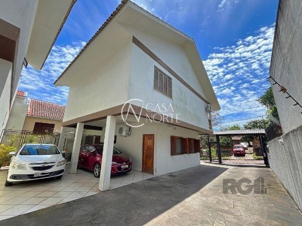Casa de Condomínio à venda com 3 quartos, 197m², 1 suíte, 2 vagas, Rua Victor Silva no bairro Camaquã em Porto Alegre