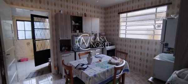 Casa à venda com 2 quartos, 90m², 2 vagas, Rua Fernando Pessoa no bairro Vila Nova em Porto Alegre