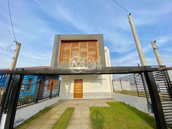 Casa à venda com 3 quartos, 217m², 1 suíte, 2 vagas, Rua Jorge Babot Miranda no bairro Aberta dos Morros em Porto Alegre