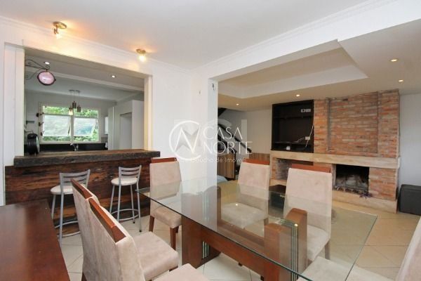 Casa de Condomínio à venda com 3 quartos, 215m², 1 suíte, 2 vagas, Doutor Arnaldo da Silva Ferreira no bairro Jardim Isabel em Porto Alegre