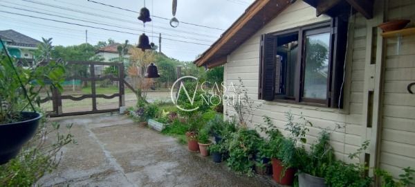 Casa à venda com 3 quartos, 150m², 1 suíte, 2 vagas, Rua dos Guenoas no bairro Guarujá em Porto Alegre