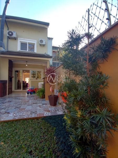 Casa à venda com 3 quartos, 90m², 1 suíte, 1 vaga, Rua Eva Pinto no bairro Hípica em Porto Alegre