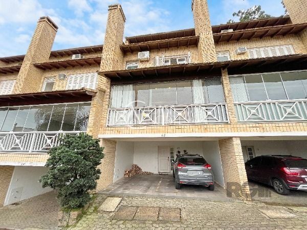 Casa de Condomínio à venda com 4 quartos, 219m², 1 suíte, 2 vagas, Rua Professor Xavier Simoes no bairro Sétimo Céu em Porto Alegre