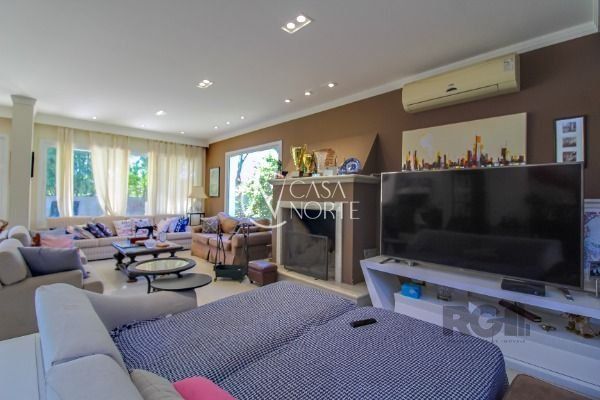 Casa de Condomínio à venda com 4 quartos, 405m², 4 suítes, 4 vagas, Avenida Juca Batista no bairro Chapéu do Sol em Porto Alegre