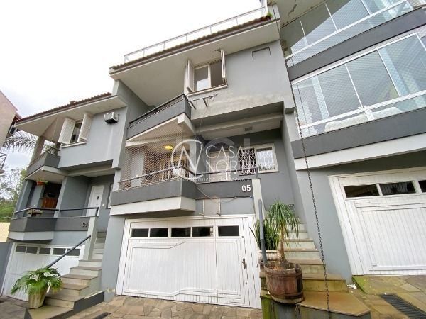 Casa de Condomínio à venda com 3 quartos, 215m², 1 suíte, 2 vagas, Doutor Arnaldo da Silva Ferreira no bairro Jardim Isabel em Porto Alegre